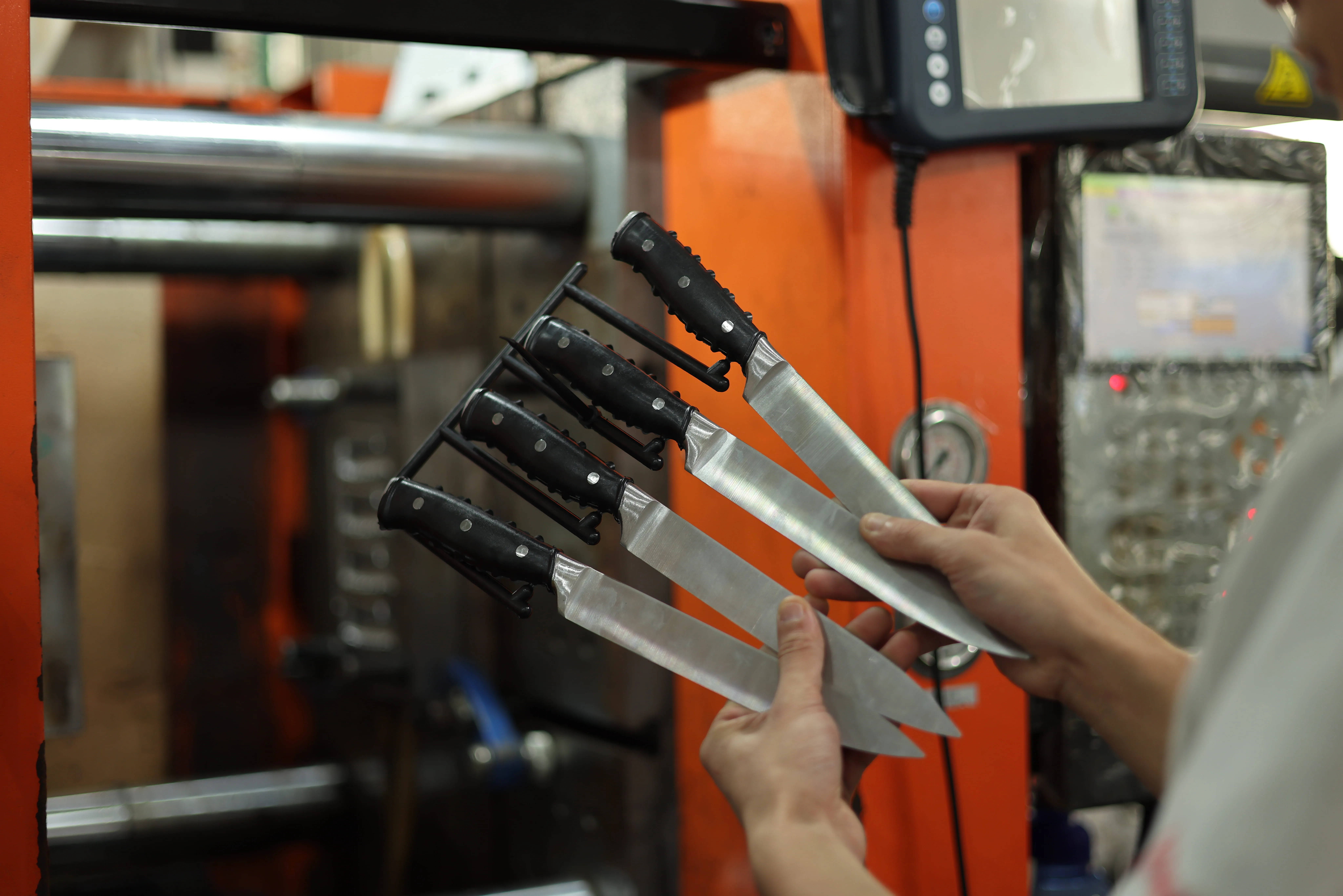 Heated knife blades during manufacturing